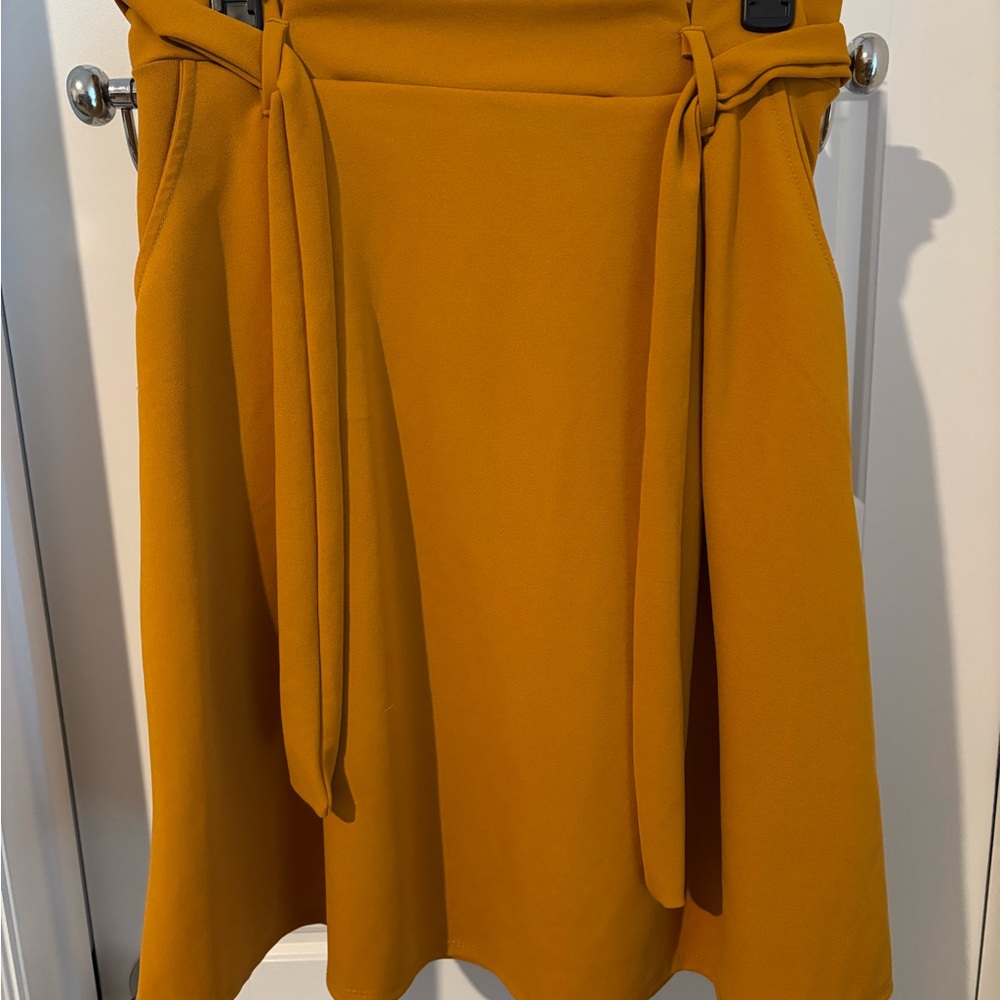 See You Monday Gold Knee-Length Wrap Skirt